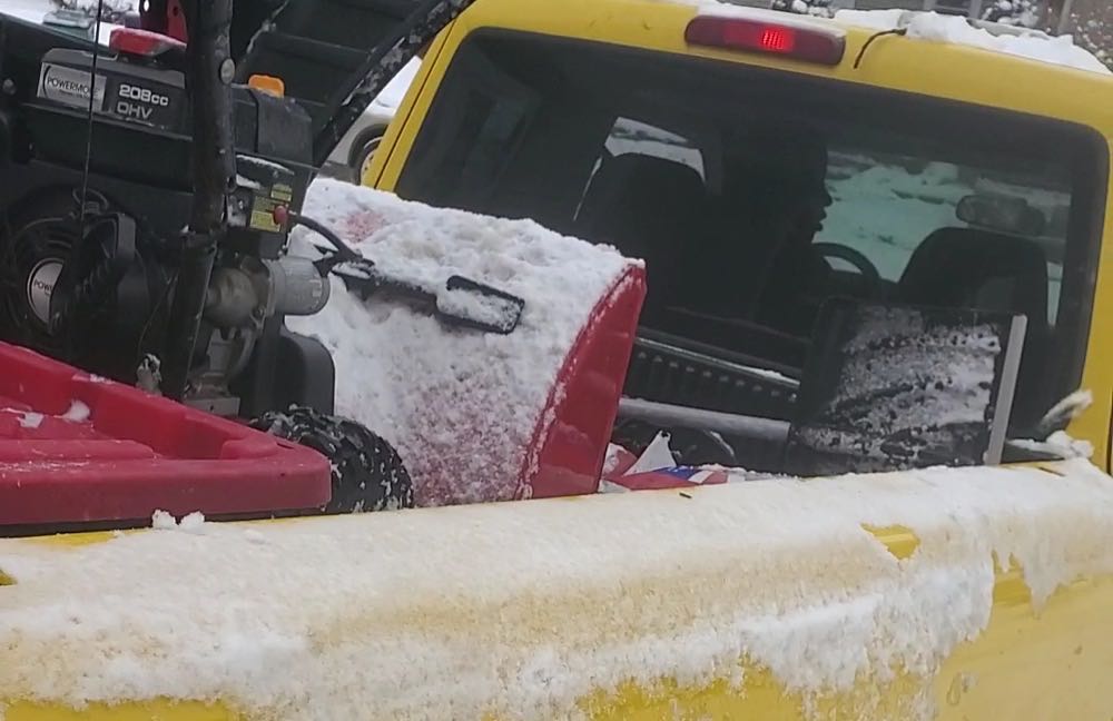 Starlite truck loaded with snowblower and shovels